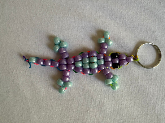 Blue and purple metallic Kandi lizard