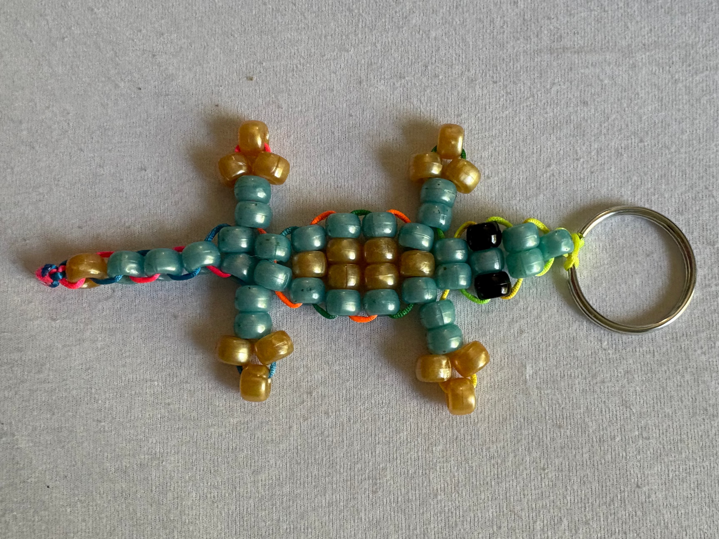 Blue and gold Kandi lizard
